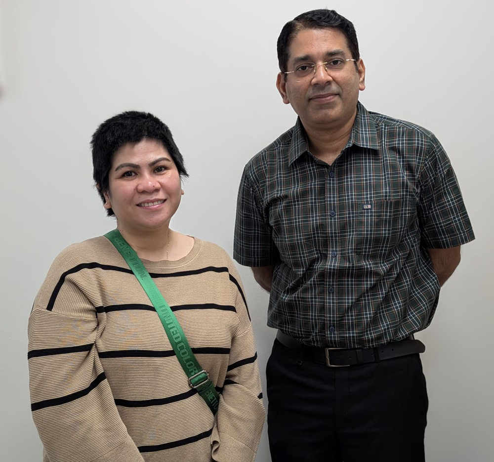 Ms. Jovelyn Sison Omes with Dr. Prakash Nair at Aster Hospital, Mankhool, where she underwent successful surgery for a rare brain tumor