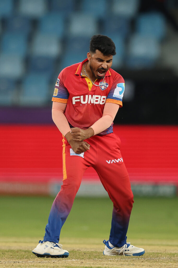 Haider Ali of Dubai Capitals celebrates the wicket of Tom Kohler-Cadmore