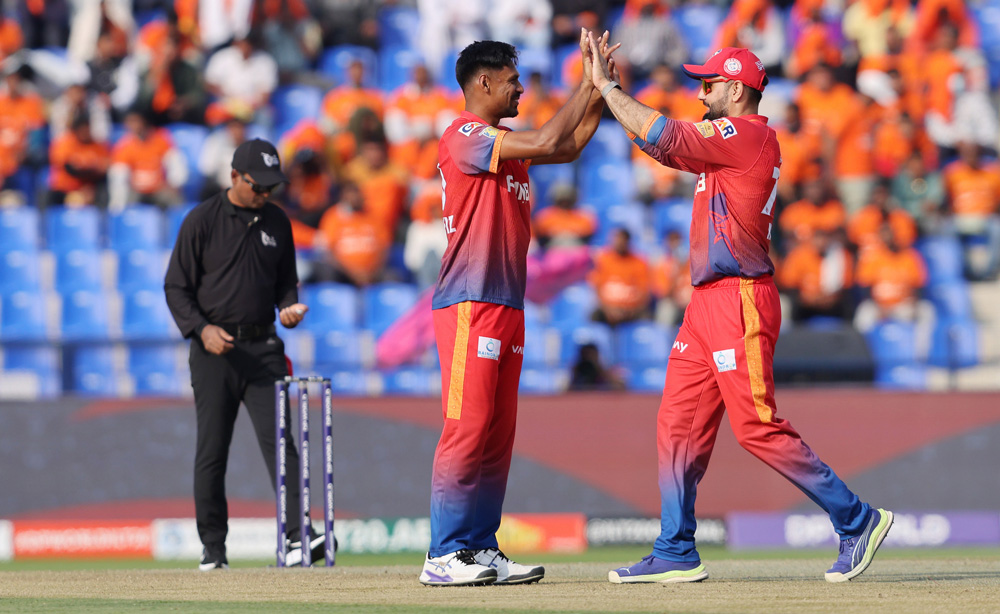 Mustafizur-Rahman-and-Mohammad-Nabi-of-Dubai-Capitals-celebrate-a-wicket-during-Match-23-of-the-DP-World-ILT20-between-the-Gulf-Giants-and-the-Dubai-Capitals