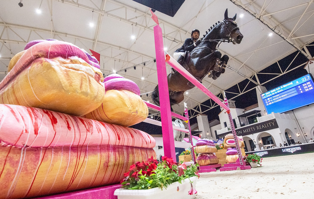Omar Abdul Aziz Al Marzooqi clearing the eclairs © Al Shira'aa Tour